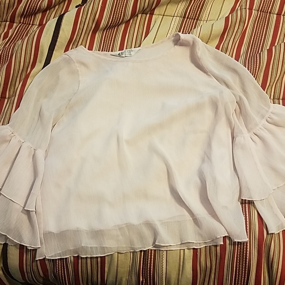 Cute top with 3/4 sheer bell sleeves